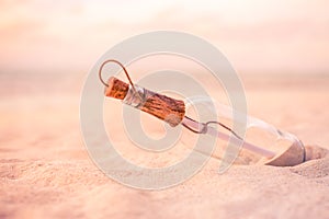 Message in a bottle on a tropical beach and blurred background. Inspire bckground design