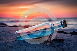 Message in a bottle washed ashore at sunset