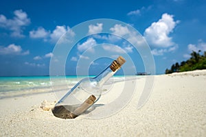 Message in a bottle washed ashore on tropical beach.