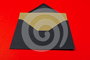 Message. Dark green envelope with notecard blank for your copy on red background