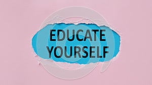 The message educate yourself written on a business card. Self education training guidance or consultancy concept