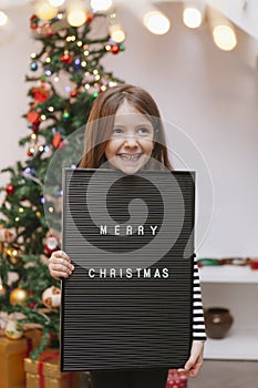 Message of merry christmas on a black chalkboard