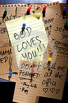 Message or reminder board with God loves you note