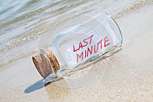 Message in a vintage bottle Last minute on beach.