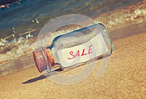 Message in a vintage bottle Sale on beach