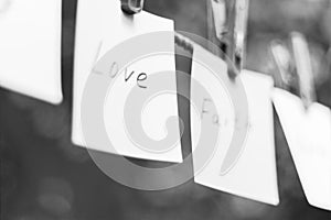 Messages hanging on the clothesline black-white