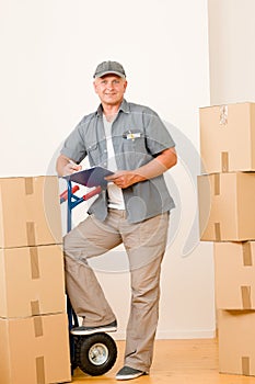 Messenger mature male courier delivering parcels photo