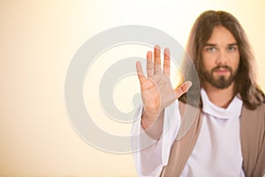Messiah raising palm of hand photo