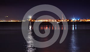 Messina harbor and lighthouse at night