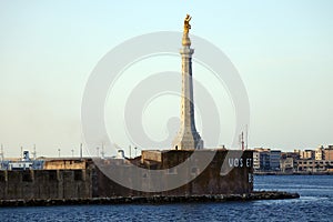 Messina, Sicily Italy: view of the port of Messina entrance with the gold Statue of the Madonna della Lettera