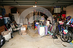 Messy abandoned garage full of stuff photo