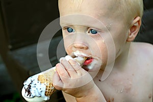 Messy Baby Eating Ice Cream Cone