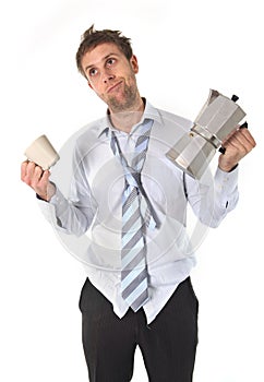 Messy business man with hangover holding coffee pot