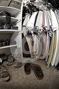 Messy Closet in House with Clothes and Shoes