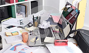 Messy and cluttered desk