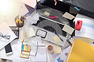 Messy and cluttered desk, light effect