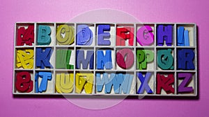 Messy colorful wooden alphabetic kid toys