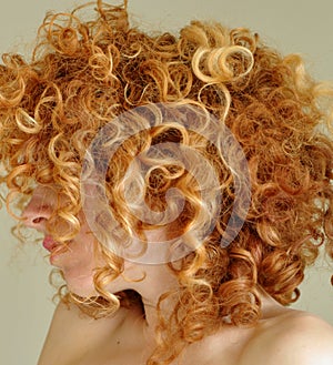 Messy curly red hair