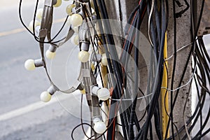Messy electrical cables in thailand - Uncovered optical fiber technology open air outdoors asian cities
