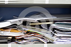 Messy file document and Office Supplies in filing cabinets