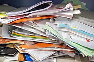 Messy file document and Office Supplies in filing cabinets