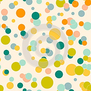 Colorful messy dots on beige background. Festive seamless pattern with round shapes.