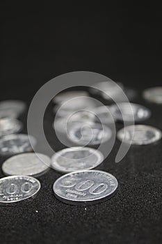 Messy of Indonesian coins with background black