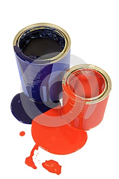 Messy untidy paint cans with spilled paint dripping, isolated on white background