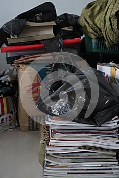 Messy stack of old books in the storehouse