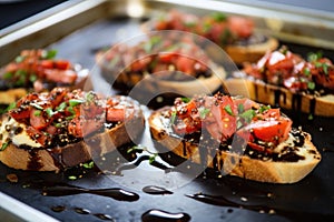 messy toasted bruschetta generously coated with truffle oil