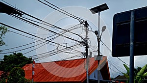 messy wires on electric poles in Manado city