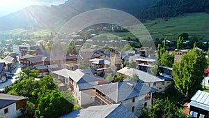 Mestia svan towers at bright sunny day, aerial view