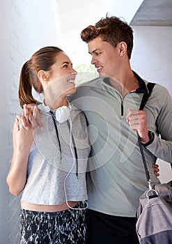 They met at the gym...a sporty young couple on their way to the gym together.