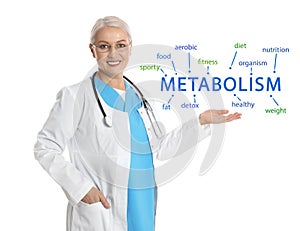 Metabolism concept. Mature doctor presenting scheme on white background