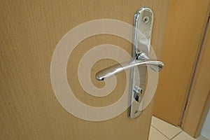 Metail door handle on a modern door