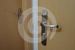 Metail door handle on a modern door