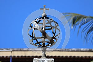 Metal Armillary Sphere, Esfera Armilar, a Portugal symbol and old navigation tool, at Fernando de Noronha, Brazil