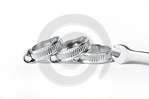 Metal band hose clamp isolated on white background close up