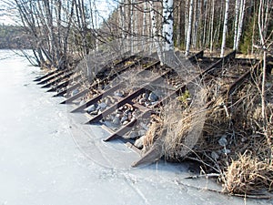 Metal bars at old timber rafting site