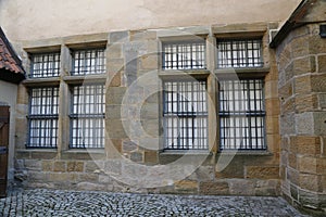 Metal bars on the Windows and doors of the Castle