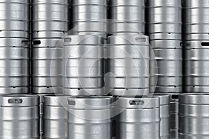 Metal beer kegs stack background. 3D illustration