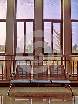 metal bench against french windows