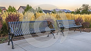 Metal benches on a beautiful park in Daybreak Utah