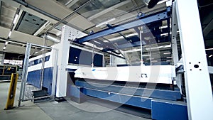 Metal bending machine on a modern industrial factory.