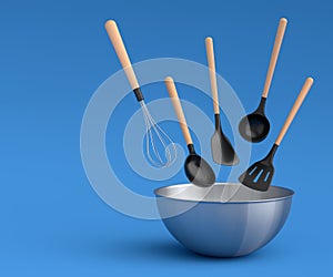 Metal bowl with kitchen utensil for preparation of dough on blue background.