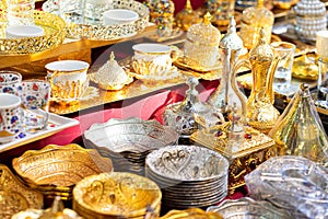 Metal bowls, dishes in market traditional Asian turkish bowls kitchenwear in silver and golden metal