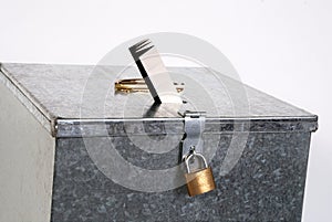 Metal box with padlock ticket voting