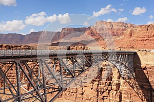 The metal bridge in abrupt coast of desert