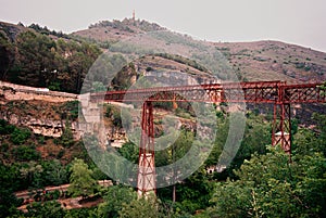 Metal bridge over the Huecar river valley. photo