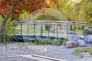 Metal bridge in park in Nuremberg in spring